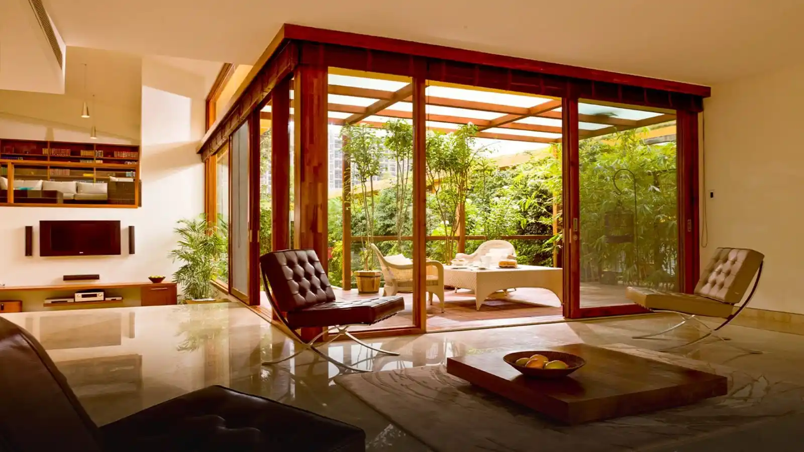 Villa-living-room-opening-into-wodden-deck